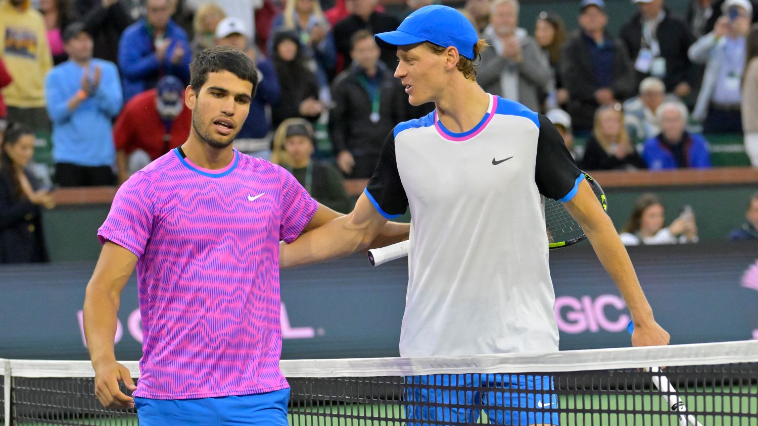 Carlos Alcaraz is congratulated by Jannik Sinner after winning their semi-final match in the BNP Paribas Open at Indian Wells.