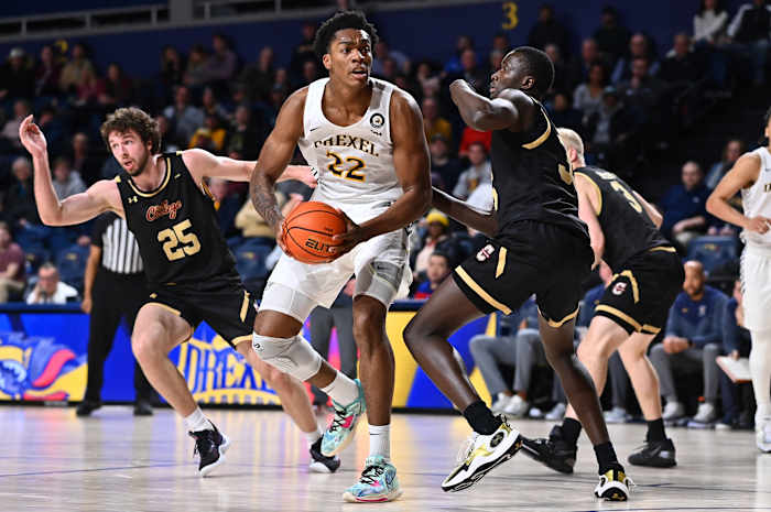 Drexel Dragons forward Amari Williams (22) drives against Charleston Cougars forward Babacar Faye (35) in the second half at Daskalakis Athletic Center.