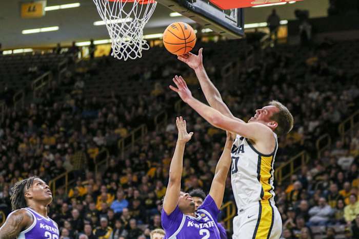 Iowa's Payton Sandfort (20) shoots during a first-round NIT game against Kansas State on March 19, 2024 in Iowa City, Iowa. (Rob Howe/HN)