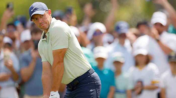 Rory McIlroy prepares for a shot on the 9th tee during the final round of the 2024 Players Championship at TPC Sawgrass  in Ponte Vedra Beach, Fla.