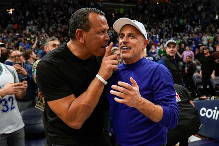 Apr 12, 2022; Minneapolis, Minnesota, USA; Minnesota Timberwolves co-minority owners Alex Rodriguez and Marc Lore celebrate a victory over the Los Angeles Clippers after a play-in game at Target Center. 