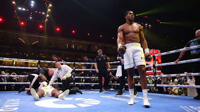 Francis Ngannou is knocked down during the Heavyweight fight between him and Anthony Joshua on the Knockout Chaos boxing card at the Kingdom Arena. According to WBC president , Joshua would be accepted to challenge Usyk or Fury for the undisputed heavyweight title. RICHARD PELHAM.