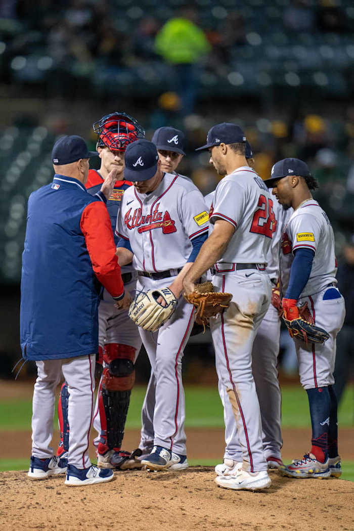 May 30, 2023; Oakland, California, USA; Atlanta Braves manager Brian Snitker (43) relieves starting pitcher Bryce Elder (55) during the eighth inning at Oakland-Alameda County Coliseum.