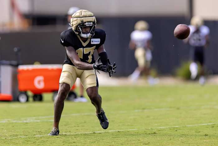 New Orleans Saints wide receiver A.T. Perry (17) catches passes during training camp at the Ochsner Sports Performance Center. Mandatory Credit: Stephen Lew-USA TODAY Sports
