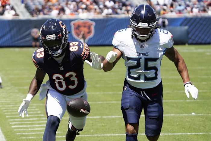 Titans' cornerback Armani Marsh (25) defends Chicago Bears wide receiver Nsimba Webster (83) during the second quarter at Soldier Field.
