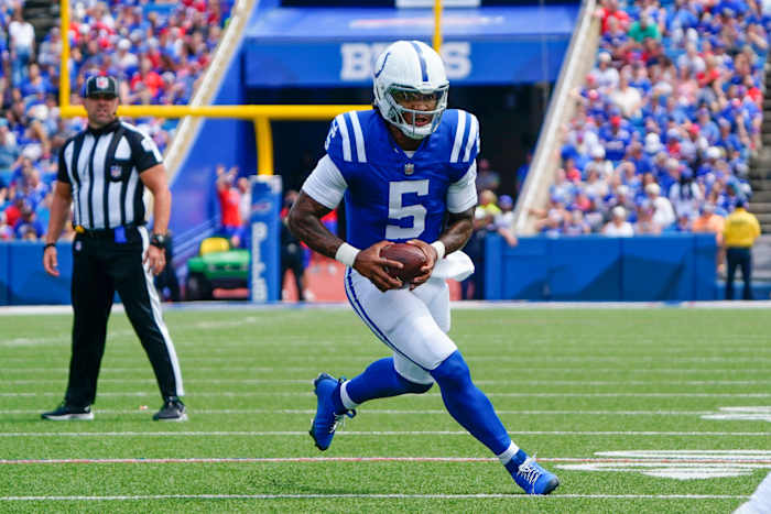 Aug 12, 2023; Orchard Park, New York, USA; Indianapolis Colts quarterback Anthony Richardson (5) runs with the ball against the Buffalo Bills during the first half at Highmark Stadium.