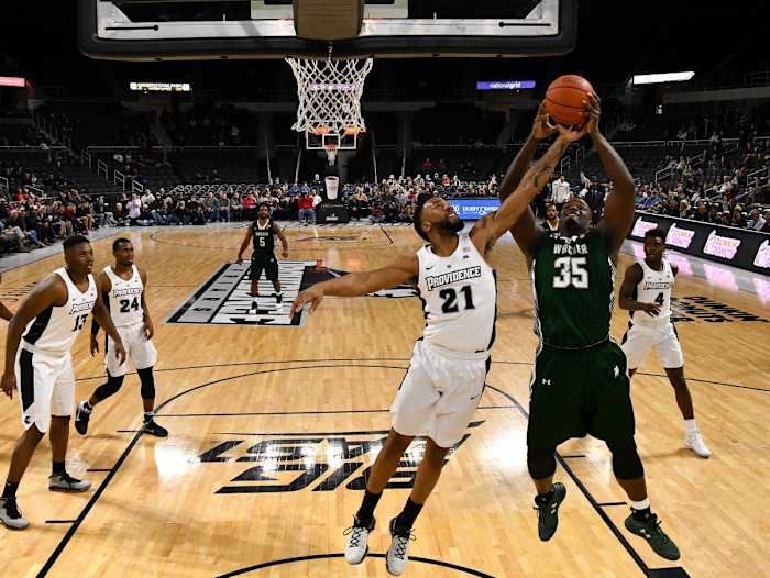 Greg Senat (35) goes up toward the basket at Providence