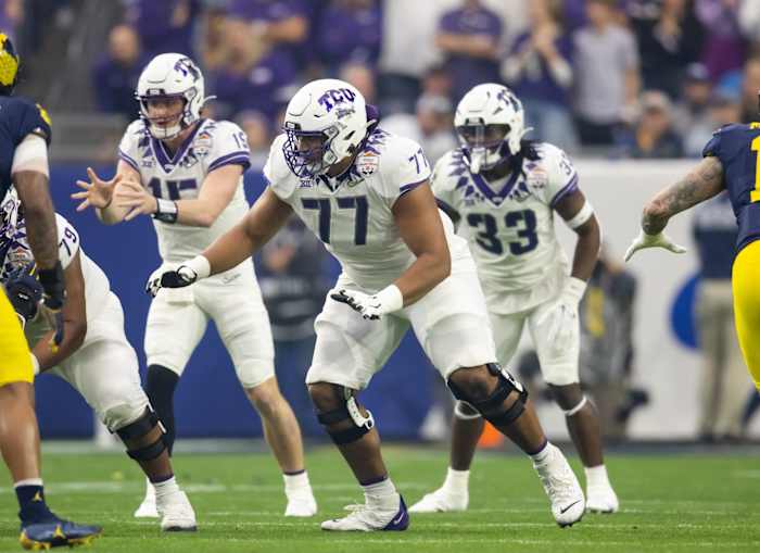 TCU Horned Frogs offensive lineman Brandon Coleman (77) against the Michigan Wolverines during the 2022 Fiesta Bowl at State Farm Stadium.