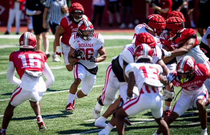 Indiana's Josh Henderson (26) looks for an opening during Indiana football's Spring Football Saturday event at Memorial Stadium on Saturday, April 15, 2023.