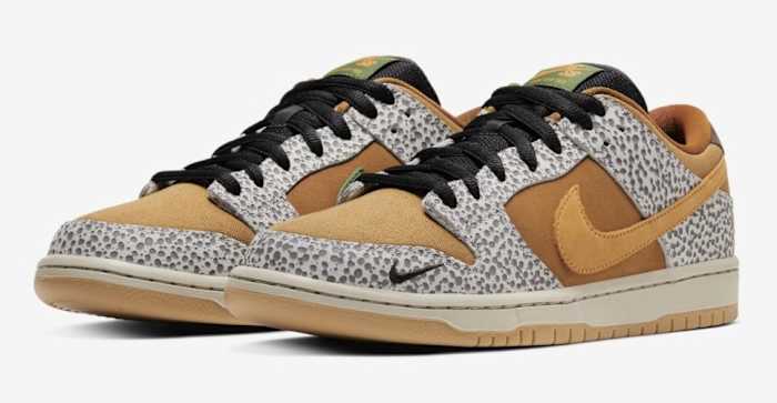 Side view of orange and grey Nike Dunk Low sneakers.