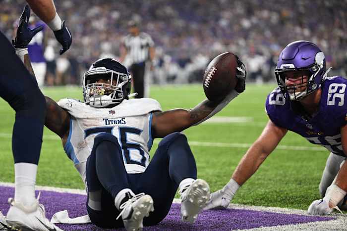 Tennessee Titans running back Julius Chestnut (36) reacts after scoring a touchdown as Minnesota Vikings linebacker Troy Reeder (59) looks on during the fourth quarter at U.S. Bank Stadium.