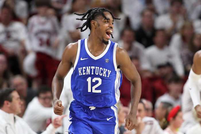 Mar 4, 2023; Fayetteville, Arkansas, USA; Kentucky Wildcats guard Antonio Reeves (12) reacts after scoring in the first in the second half against the Arkansas Razorbacks at Bud Walton Arena. Kentucky won 88-79. Mandatory Credit: Nelson Chenault-USA TODAY Sports