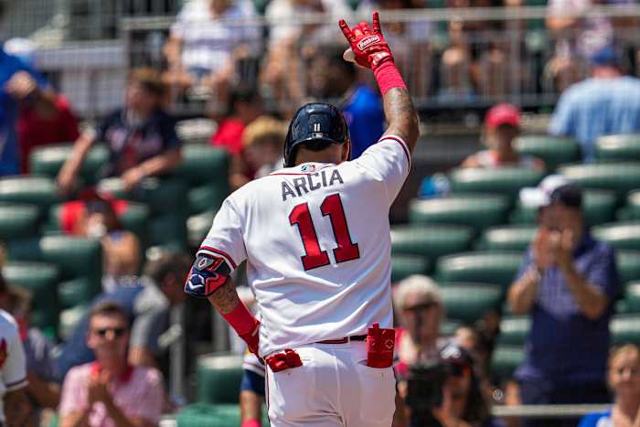 Aug 20, 2023; Cumberland, Georgia, USA; Atlanta Braves shortstop Orlando Arcia (11) reacts after hitting a home run against the San Francisco Giants during the second inning at Truist Park.