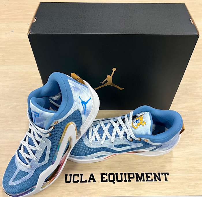 Side view of Jayson Tatum's Jordan Brand shoes in UCLA colors.