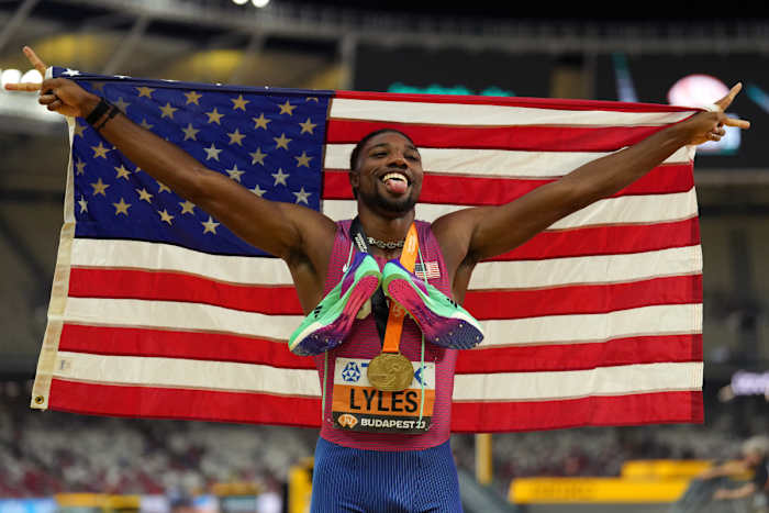 Budapest, Hungary; Noah Lyles (USA) poses for photographs after winning the mens 200m race during the 2023 World Athletics Championships at National Athletics Centre.