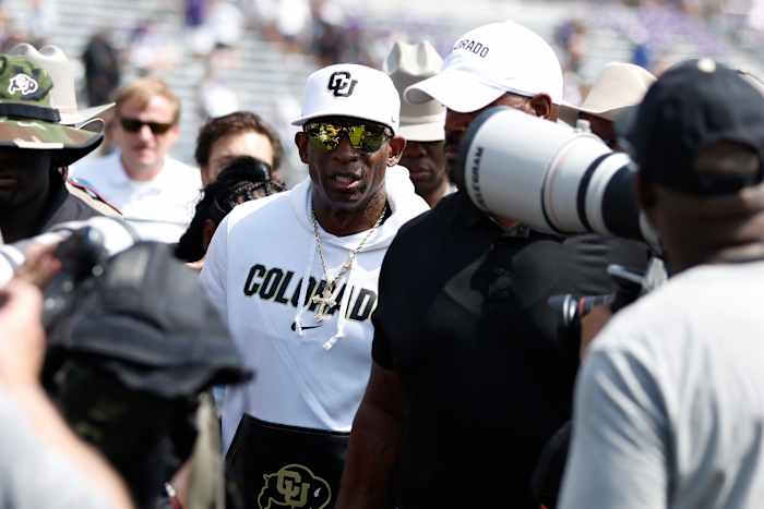 Colorado Buffaloes head coach Deon Sanders walks off the field aft winning the game against the TCU Horned Frogs at Amon G. Carter Stadium