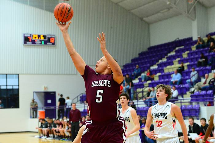 Patrick Mahomes drives to the basket in a high school game while playing for Whitehouse High School outside of Dallas. Mahomes's has revolutionized the quarterback position in the NFL with a few basketball twists.