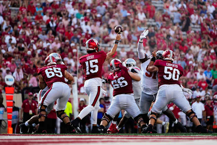 Indiana Hoosiers quarterback Brendan Sorsby (15) throws over the outstretched arm of Ohio State Buckeyes defensive tackle Michael Hall Jr. (51) during the NCAA football game at Indiana University Memorial Stadium. Ohio State won 23-3.