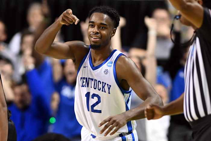 Mar 17, 2023; Greensboro, NC, USA; Kentucky Wildcats guard Antonio Reeves (12) celebrates in the first half against the Providence Friars at Greensboro Coliseum. Mandatory Credit: Bob Donnan-USA TODAY Sports