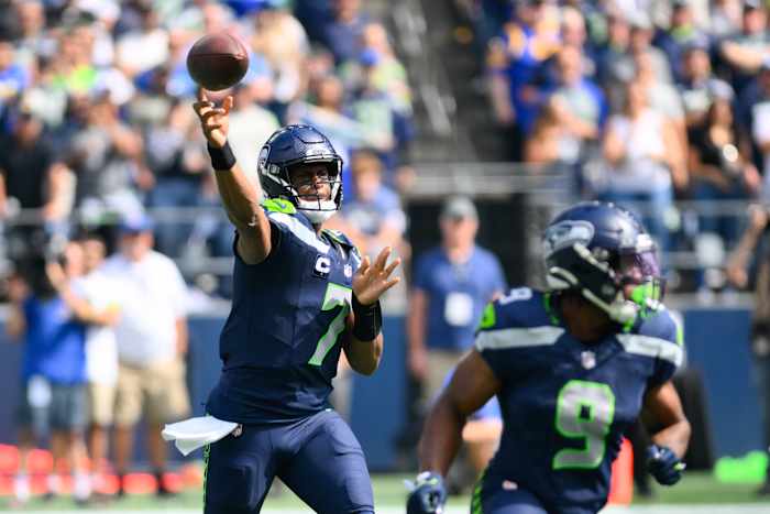 Sep 10, 2023; Seattle, Washington, USA; Seattle Seahawks quarterback Geno Smith (7) passes the ball against the Los Angeles Rams during the first half at Lumen Field. Mandatory Credit: Steven Bisig-USA TODAY Sports