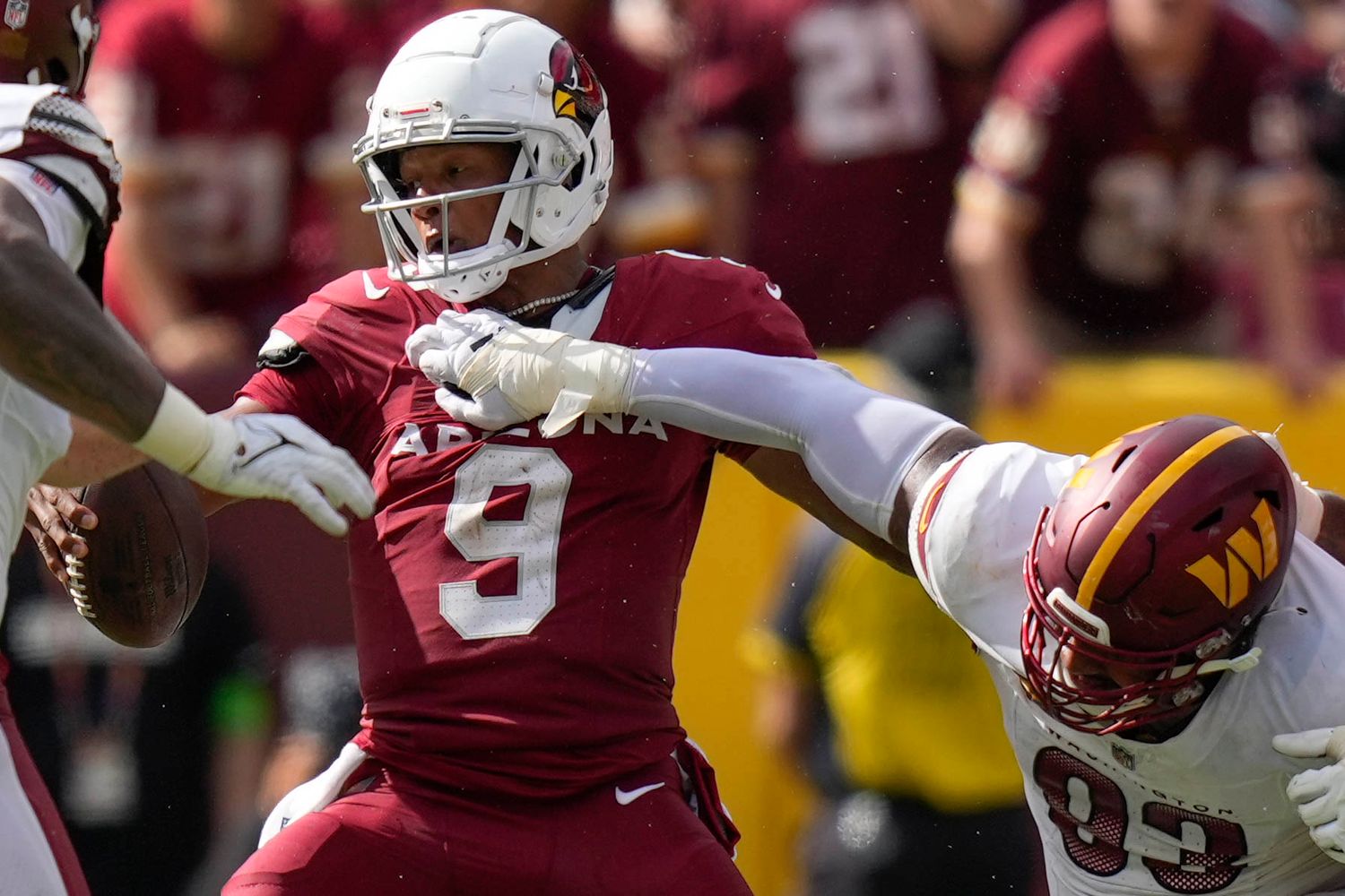 Arizona Cardinals quarterback Joshua Dobbs (9) is hit by Washington Commanders defensive tackle Jonathan Allen (93) during the second half at FedExField.