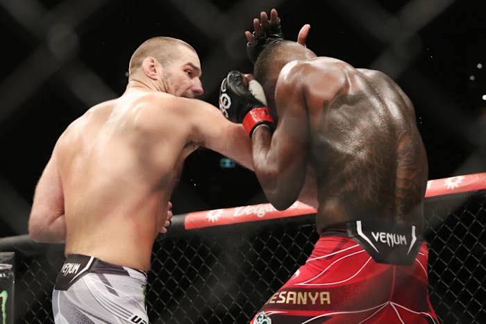 Sean Strickland throws a strike at Israel Adesanya during their middleweight title fight at UFC 293.
