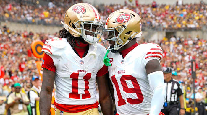 49ers wide receiver Deebo Samuel, right, congratulates teammate Brandon Aiyuk for catching a touchdown in Week 1 win over Steelers