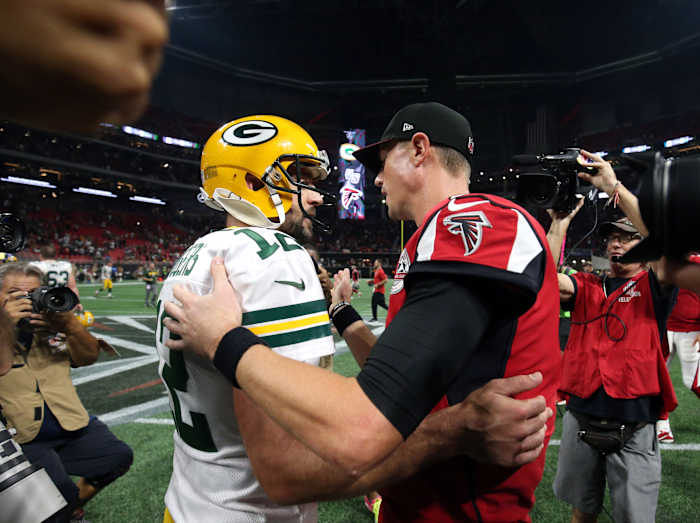 Green Bay Packers quarterback Aaron Rodgers and Atlanta Falcons quarterback Matt Ryan following a game.