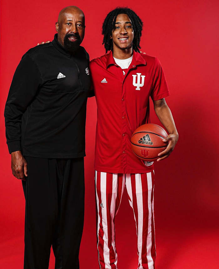 Boogie Fland, a five-star point guard in the class of 2024, is pictured with Indiana coach Mike Woodson during an official visit to Bloomington in June.