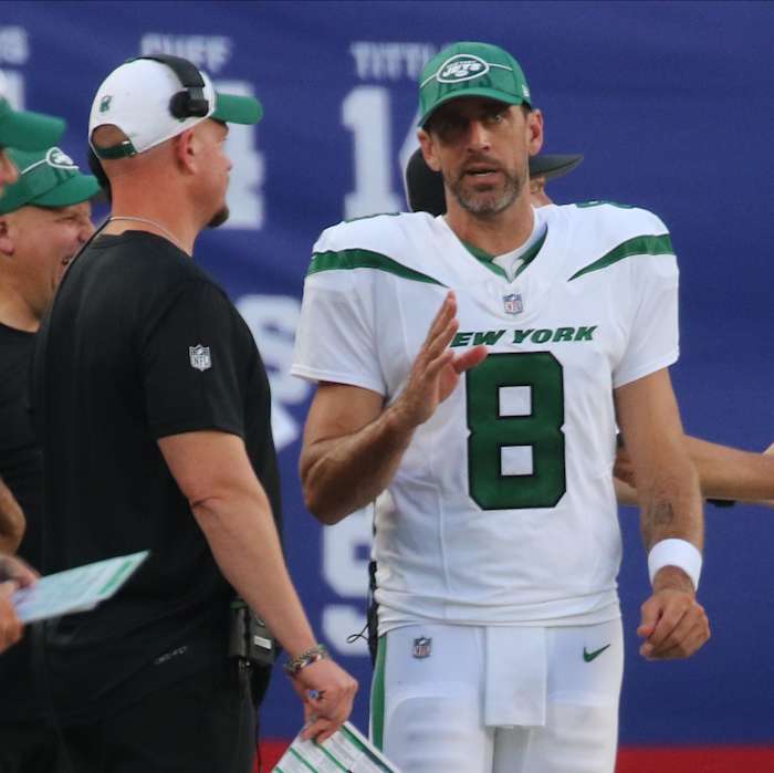 Jets' OC Nathaniel Hackett and QB Aaron Rodgers talk during NFL Preseason game