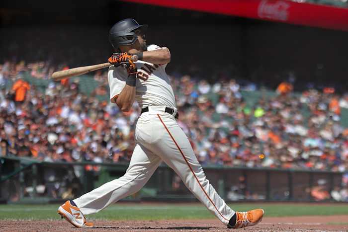 SF Giants left fielder LaMonte Wade Jr. swings for the fences at Oracle Park (2023).