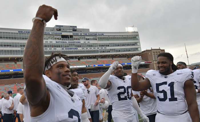 The Penn State Nittany Lions celebrate their 30-13 win over Illinois at Memorial Stadium in Champaign, Illinois.