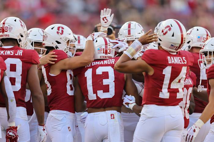 Sep 16, 2023; Stanford, California, USA; Stanford Cardinal wide receiver Elic Ayomanor (13) is congratulated by teammates after catching a touchdown pass during the second quarter against the Sacramento State Hornets at Stanford Stadium. Mandatory Credit: Sergio Estrada-USA TODAY Sports