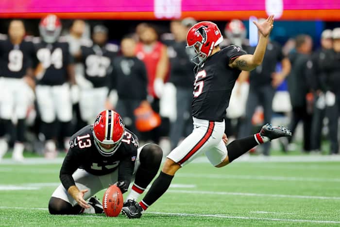 Atlanta Falcons kicker Younghoe Koo attempts a field goal against the Green Bay Packers.