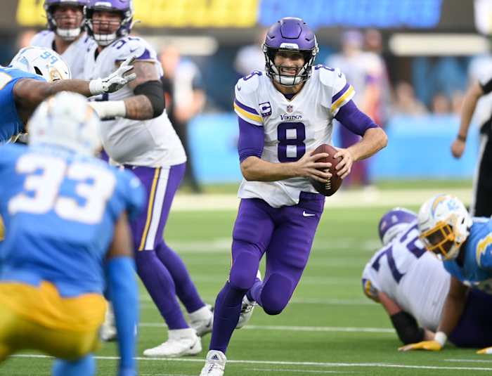 Nov 14, 2021; Inglewood, California, USA; Minnesota Vikings quarterback Kirk Cousins (8) scrambles for a first down in the first half against the Los Angeles Chargers at SoFi Stadium.