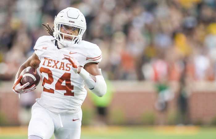 Texas running back Jonathon Brooks (24) breaks out from the back field to run in the end zone for the first score of the in the first quarter against Baylor of an NCAA college football game, Saturday, Sept. 23, 2023, in Waco, Texas.