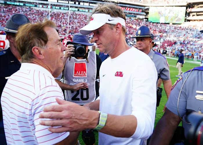 Sep 23, 2023; Tuscaloosa, Alabama, USA; Alabama Crimson Tide head coach Nick Saban greets Mississippi Rebels head coach Lane Kiffin midfield after Alabama defeated the Rebels 24-10 at Bryant-Denny Stadium. Mandatory Credit: John David Mercer-USA TODAY Sports