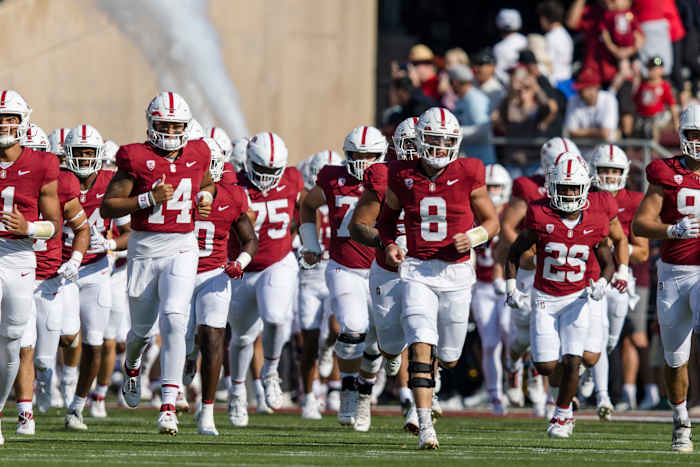 Sep 23, 2023; Stanford, California, USA; Stanford Cardinal quarterback Justin Lamson (8) and the team take the field before the game against the Arizona Wildcats at Stanford Stadium. Mandatory Credit: John Hefti-USA TODAY Sports