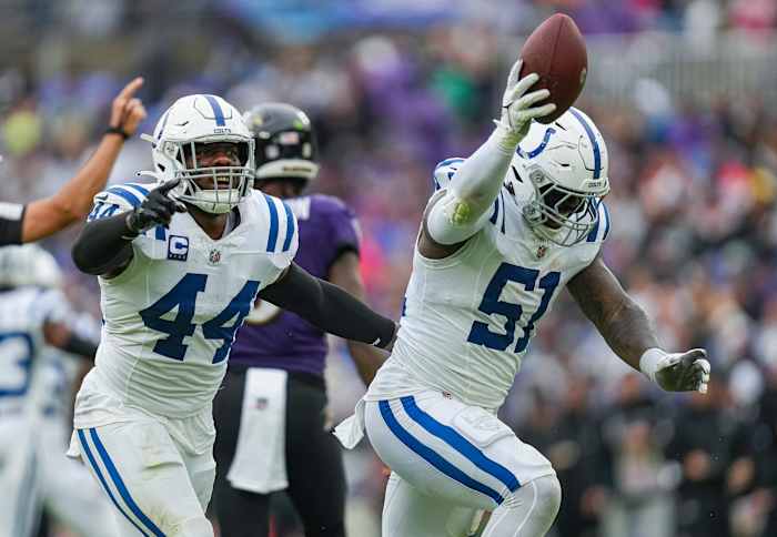 Indianapolis Colts defensive end Kwity Paye (51) and linebacker Zaire Franklin (44) celebrate a second quarter fumble recovery on Sunday, Sept. 24, 2023, at M&T Bank Stadium in Baltimore.