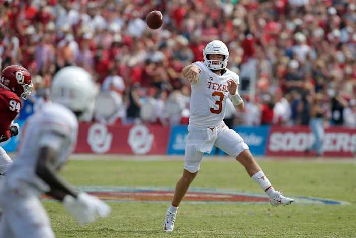 Texas Longhorns quarterback Quinn Ewers (3) throws a pass during the Red River Showdown college football game between the University of Oklahoma (OU) and Texas at the Cotton Bowl in Dallas, Saturday, Oct. 8, 2022. Texas won 49-0. Lx17927