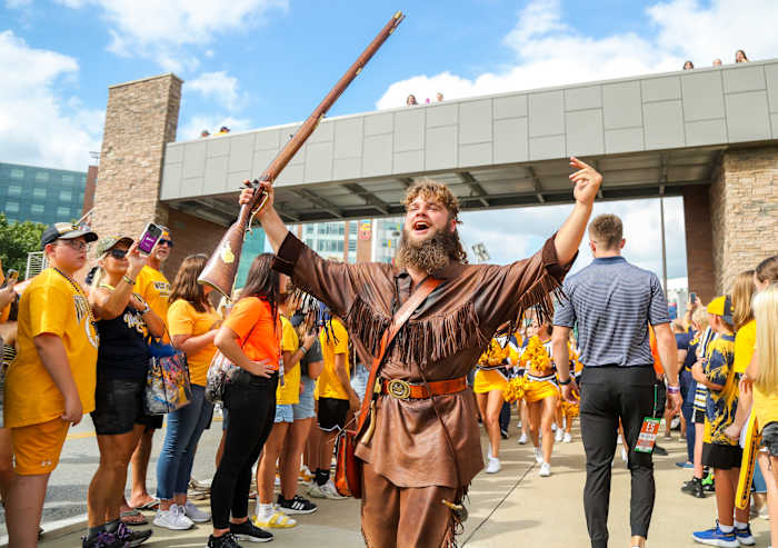 Sep 9, 2023; Morgantown, West Virginia, USA; The West Virginia Mountaineers mascot leads the Mantrip as players arrive before their game against the Duquesne Dukes at Mountaineer Field at Milan Puskar Stadium. Mandatory Credit: Ben Queen-USA TODAY Sports