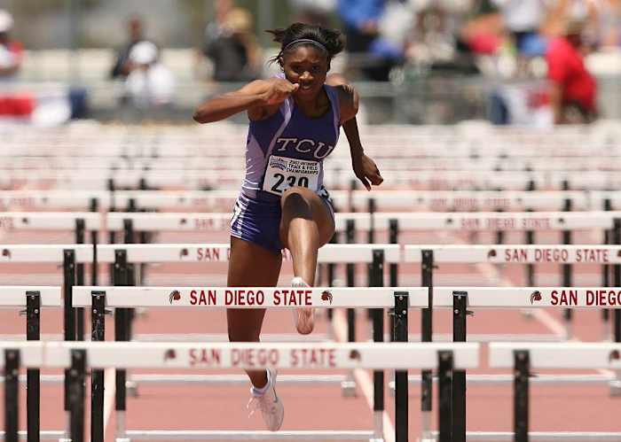 Kishelle Paul Guy runs the 400-meter hurdles for TCU in 2008. (gofrogs.com)