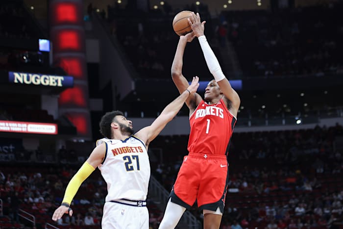 Troy Taormina-USA TODAY Sports, Rockets forward Jabari Smith Jr. shoots the ball as Denver Nuggets guard Jamal Murray.