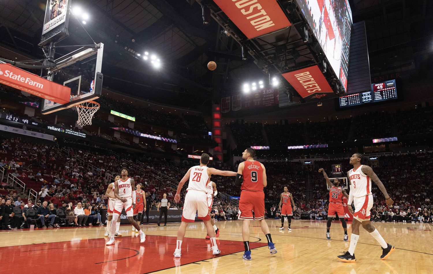 Chicago Bulls guard Patrick Beverley (21) shoots a three point shot against the Houston Rockets in the second quarter at Toyota Center.