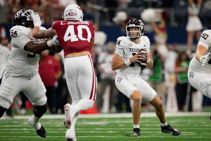 Max Johnson drops back to pass