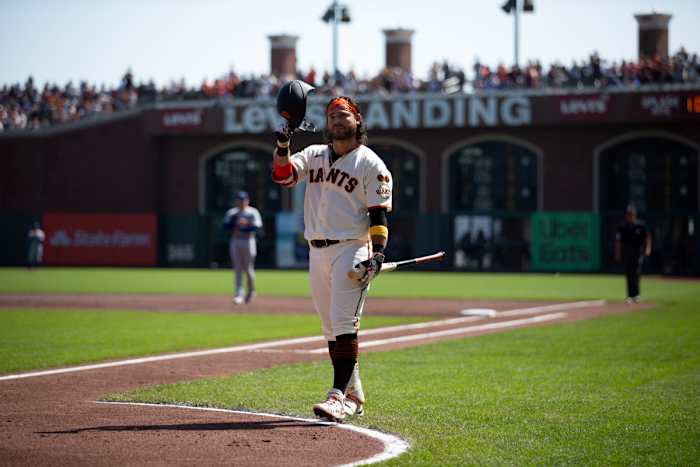 SF Giants shortstop Brandon Crawford acknowledges the cheers of the crowd as he comes to bat against the Los Angeles Dodgers during the first inning at Oracle Park on October 1, 2023.