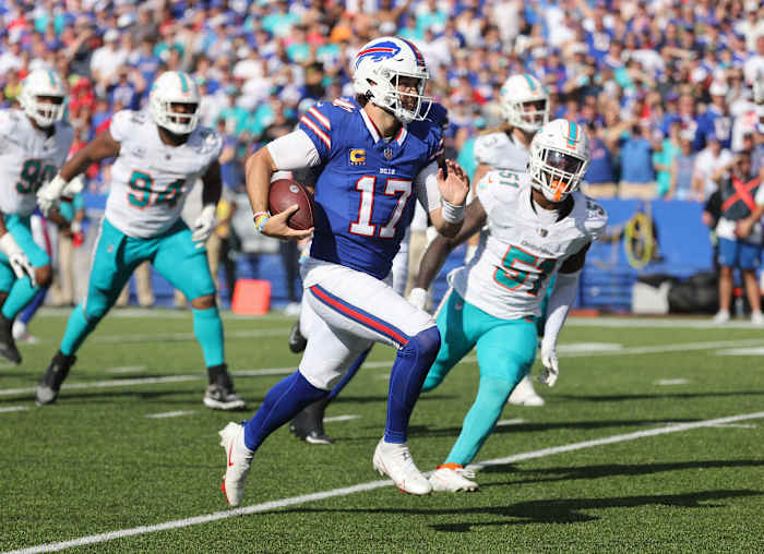 Bills quarterback Josh Allen tossed four touchdown passes and ran for another against the Dolphins in Week 4.