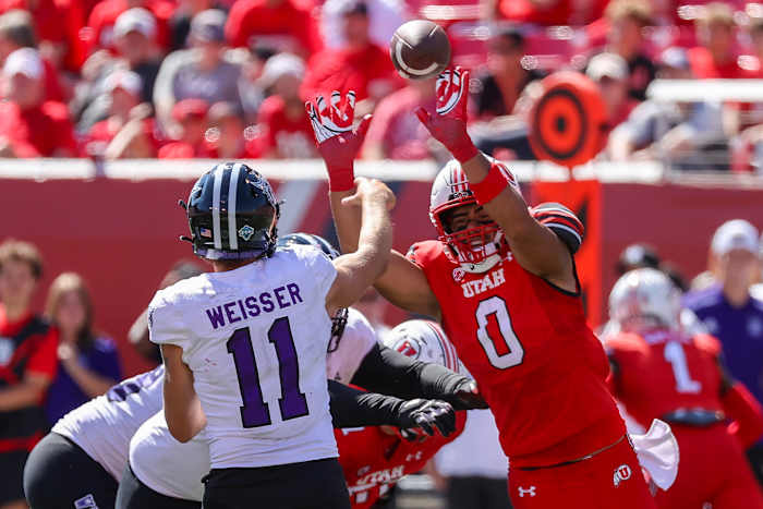 Sep 16, 2023; Salt Lake City, Utah, USA; Utah Utes defensive end Logan Fano (0) pressures Weber State Wildcats quarterback Kylan Weisser (11) in the second half at Rice-Eccles Stadium. Mandatory Credit: Rob Gray-USA TODAY Sports