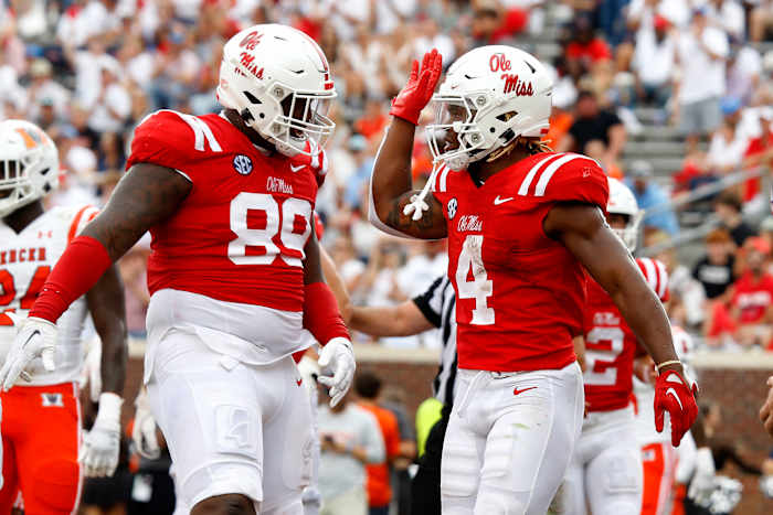 Sep 2, 2023; Oxford, Mississippi, USA; Mississippi Rebels running back Quinshon Judkins (4) reacts with Mississippi Rebels defensive linemen JJ Pegues (89) after a touchdown during the second half against the Mercer Bears at Vaught-Hemingway Stadium. Mandatory Credit: Petre Thomas-USA TODAY Sports