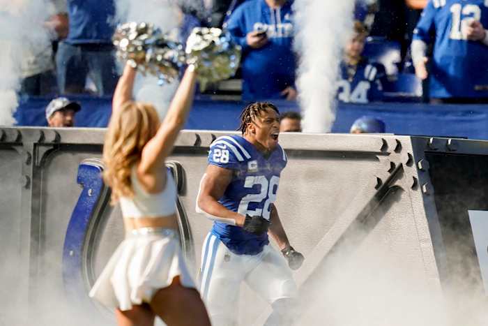 Indianapolis Colts running back Jonathan Taylor (28) runs out of the tunnel Sunday, Nov. 20, 2022, before a game against the Philadelphia Eagles at Lucas Oil Stadium in Indianapolis. Taylor rushed for 84 yards on 22 carries while also scoring the first touchdown of the game.  
